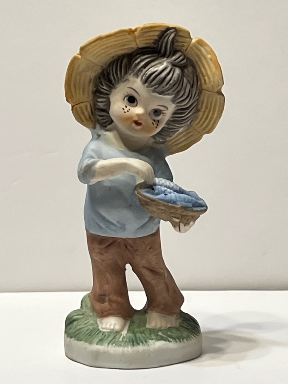 Vintage Boy Figurine Holing Basket Of Fish